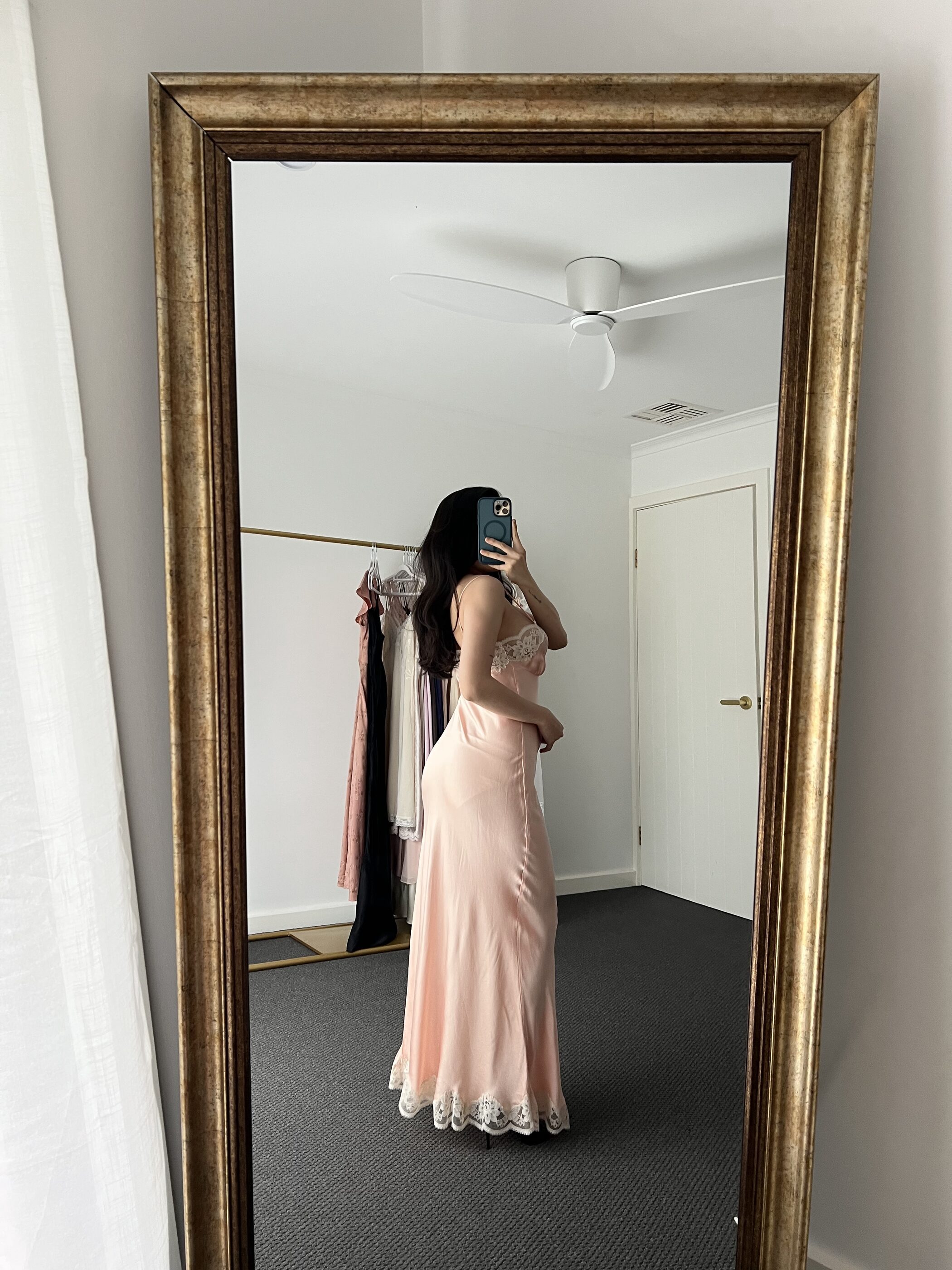 The gown from the side, following the bias cut