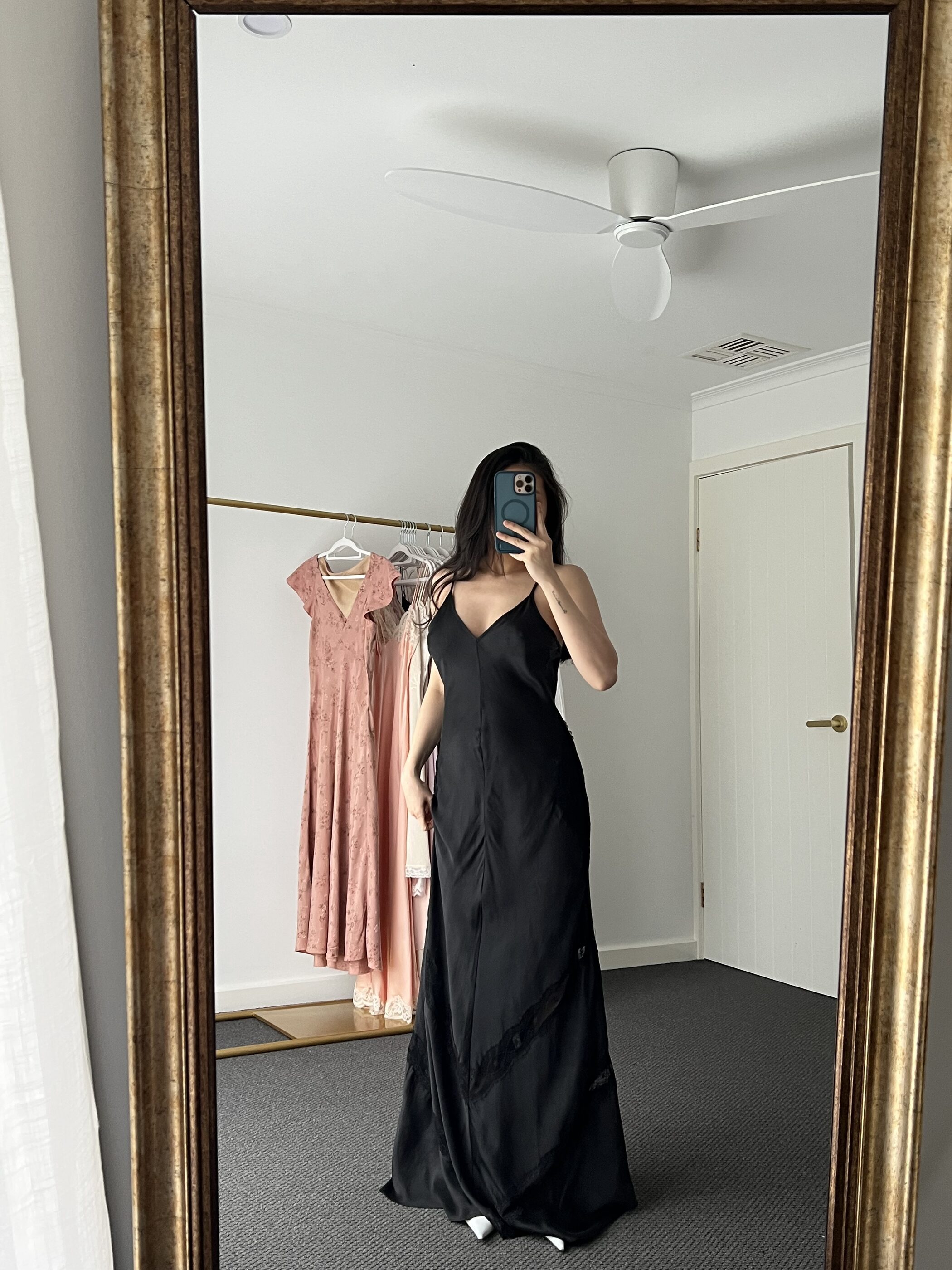 The black gown full length from the front